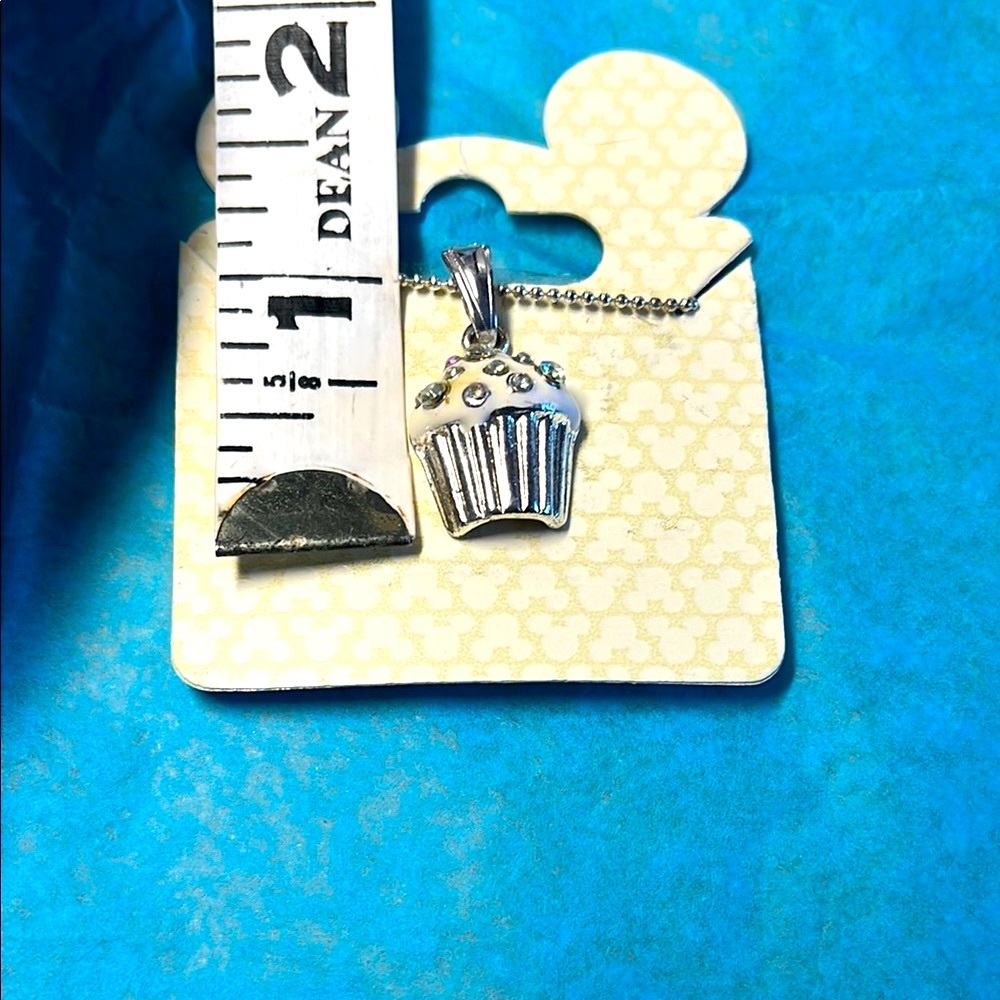 Disney Parks Merchandise Silver Tone and White Enamel Cupcake Pendant Necklace - Picture 4 of 4